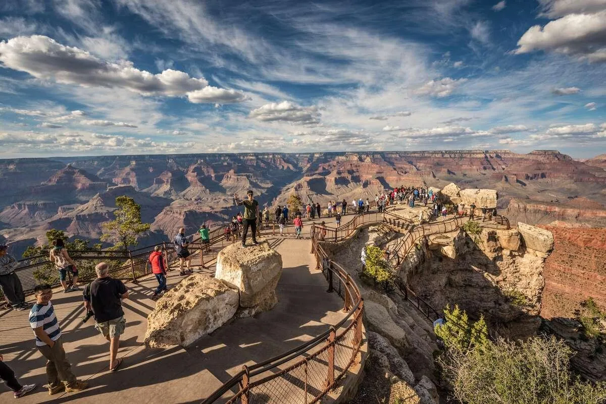 Visitors at a Grand Canyon South Rim viewpoint